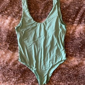 Size medium, one piece suit by Mai Intimates in the “Bonita” style